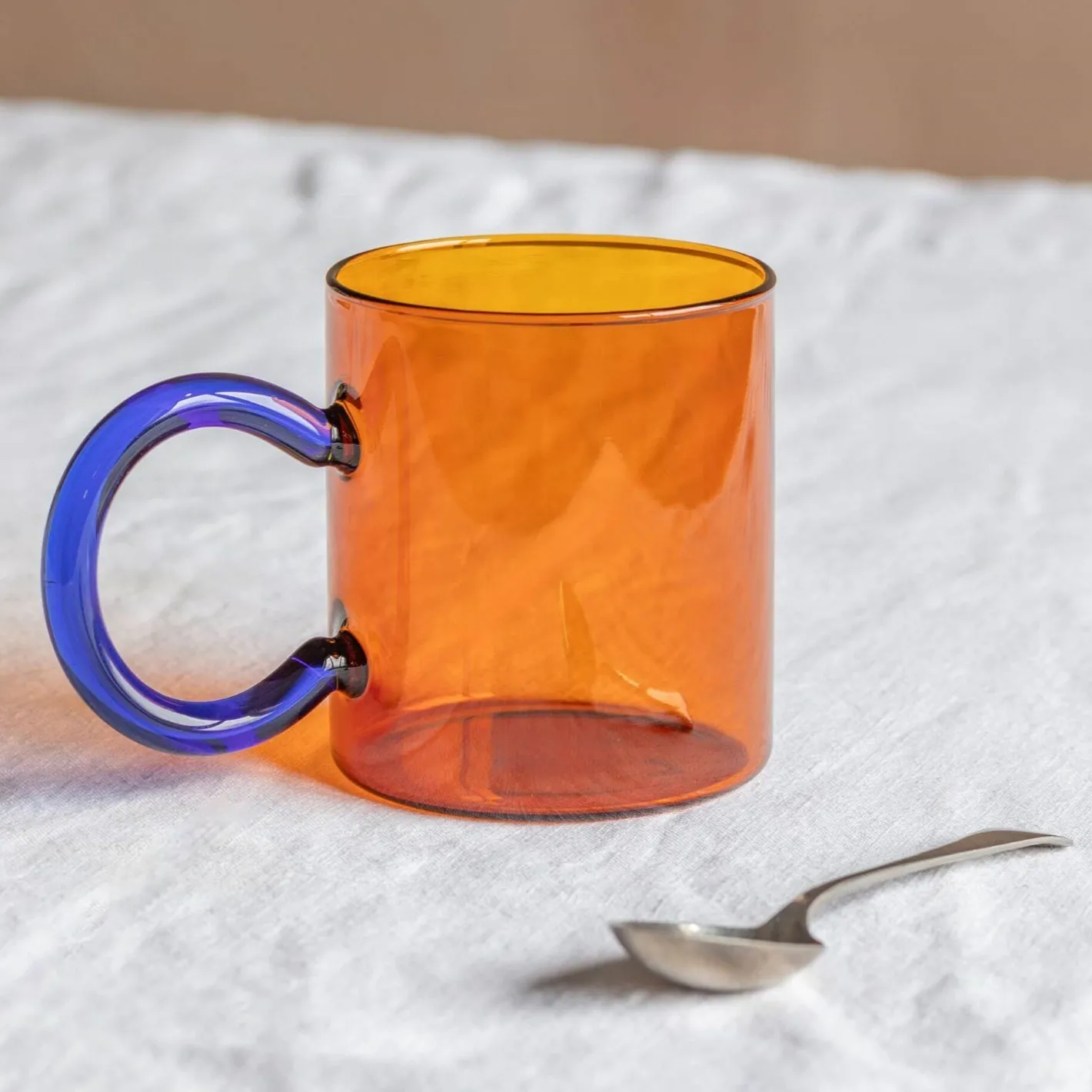 Graham & Green Glassware|Tableware<Amber Glass Mug with Blue Handle